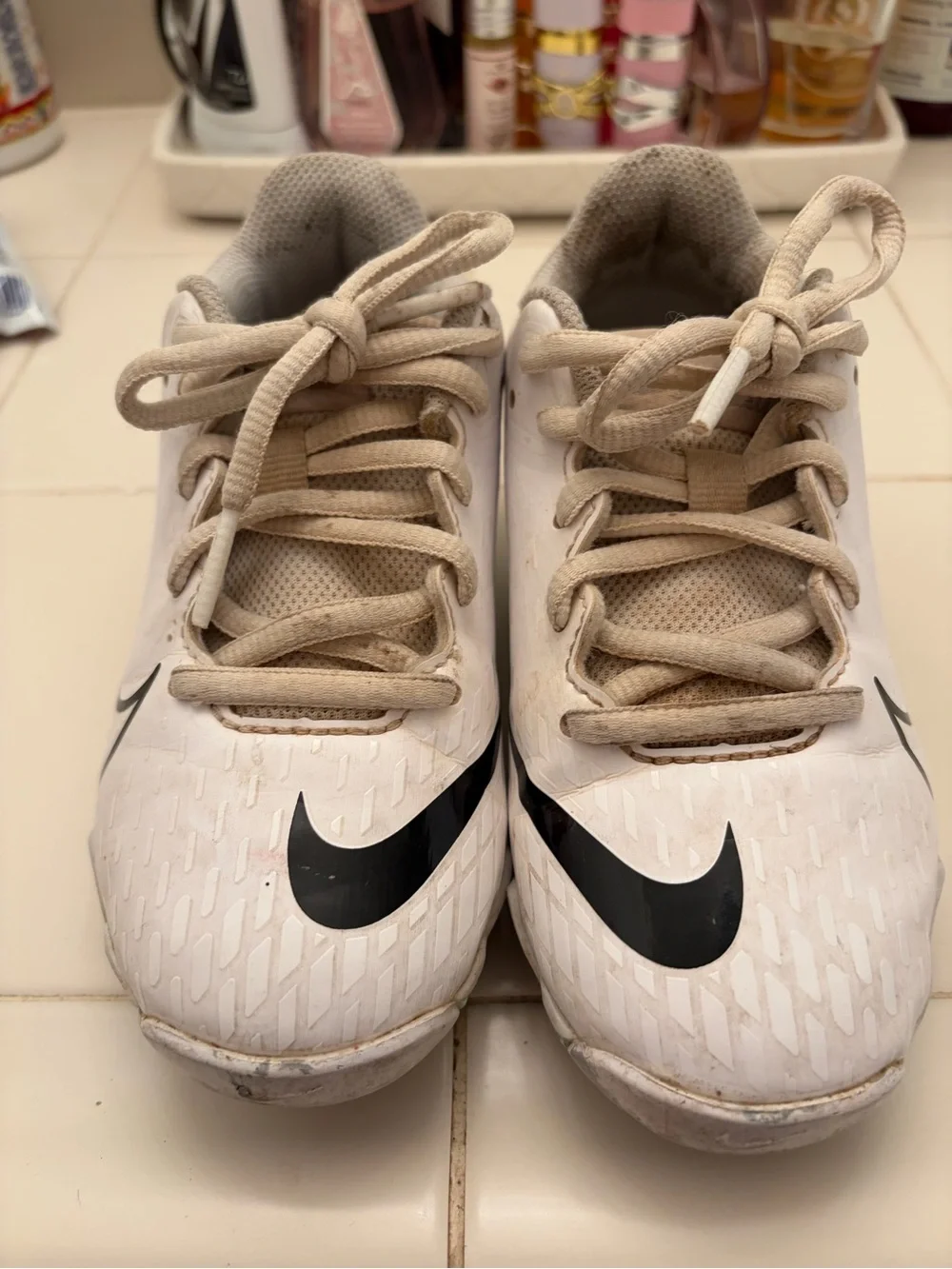 Nike Kids White Sneakers with Black Swoosh